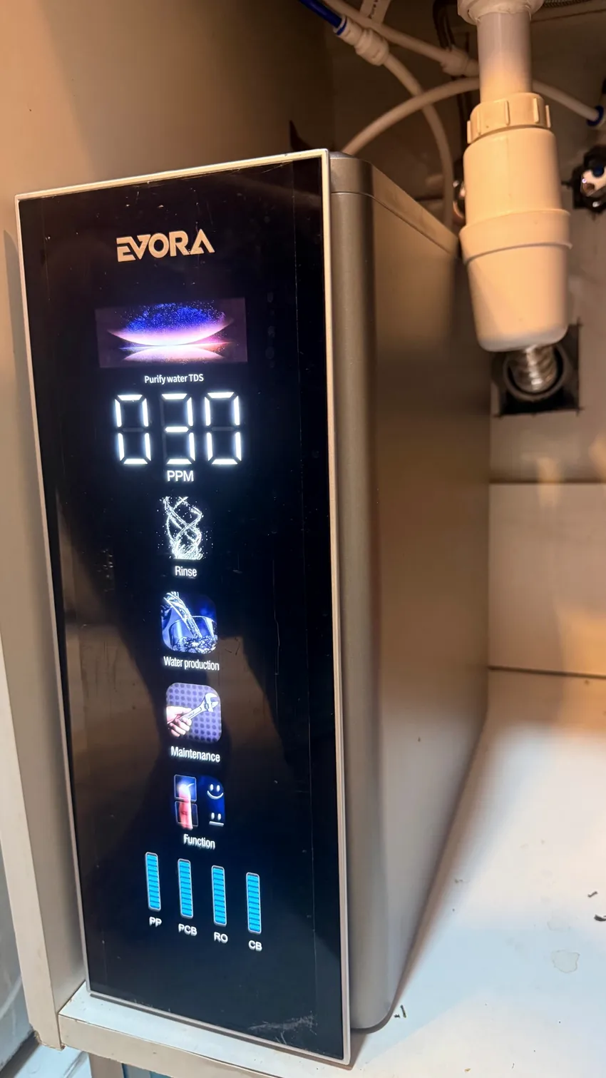 Original photograph of the actual Evora filtration unit beneath a sink